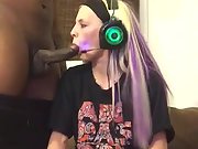 Blonde milf girl bj's a black cock while playing vid games